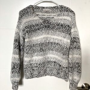 Black, grey, and white fuzzy sweater